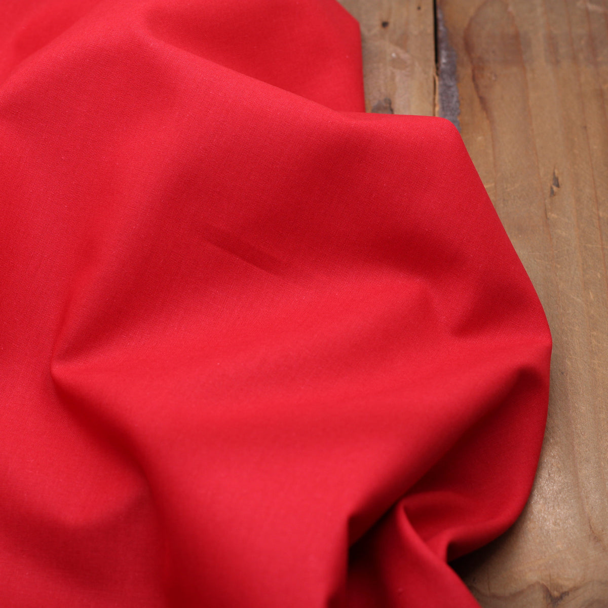 Tissu popeline de coton uni rouge (Vendu x10cm) Tissus Sélection Gaspard & Léonie | Gaspard et Léonie Tissus en ligne et Mercerie à Toulouse